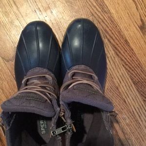 Navy and gray rubber Sperry boots.